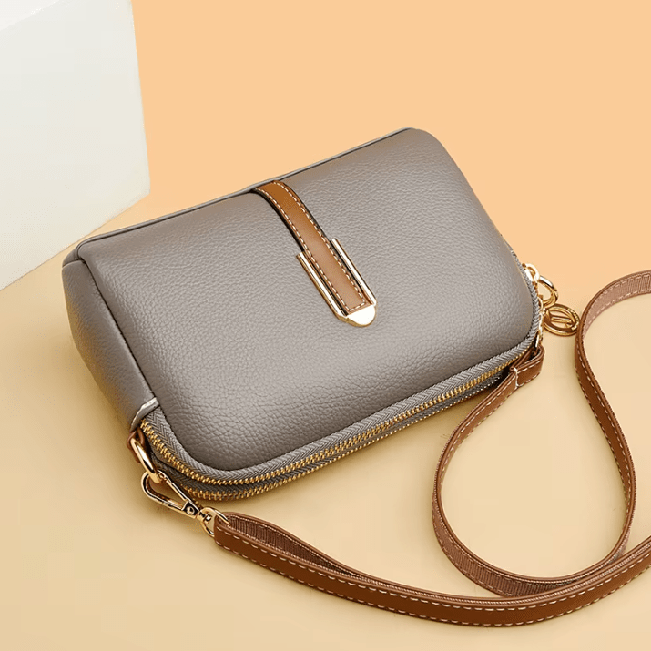 Táto kompaktná crossbody kabelka je ideálna na dni plné pohybu
